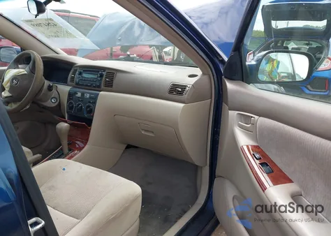 2005 Toyota Corolla Le z USA, uszkodzony, nr VIN 2T1BR32E75C422935